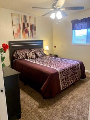 Killeen apartment for rent - a bedroom with a bed and a ceiling fan