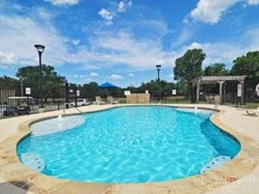 Killeen apartment for rent - a large pool of water in a resort pool