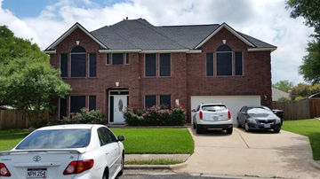 Austin apartment for rent - a house with three cars parked in front of it