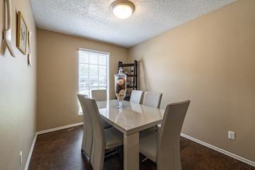 San Antonio apartment for rent - A dining room with a table and chairs.