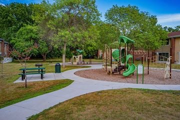 Minnetonka townhouse for rent - a playground in a park next to a building