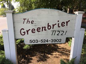 Portland apartment for rent - a white sign that reads the greenbler in front of a street