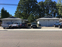 Aloha apartment for rent - a street scene with cars parked in front of a house