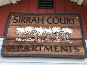 Vancouver apartment for rent - a sign for the strain court apartments