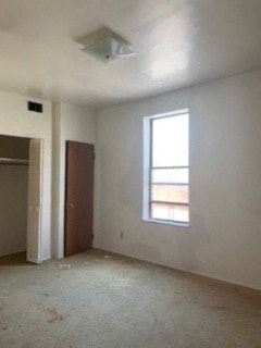 Glassport apartment for rent - an empty room with a window and a door
