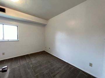 Glassport apartment for rent - a living room with white walls and a window