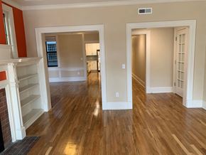 Saint Louis apartment for rent - a living room and dining room with a hard wood floor