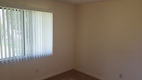 West Hills apartment for rent - A room with a window covered in blinds.