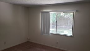 West Hills apartment for rent - A room with a window and a white wall.