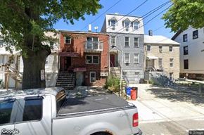Union City apartment for rent - a white truck parked in front of an old house