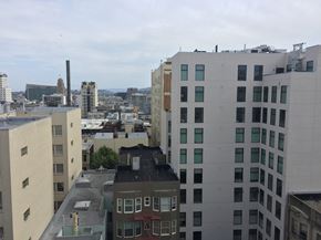 San Francisco apartment for rent - a view of the city from the roof of a building