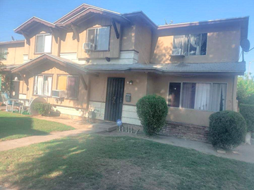Norwalk apartment for rent - A house with a brown roof and a black door.