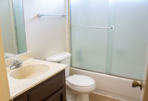 Merced house for rent - a bathroom with a sink toilet and shower
