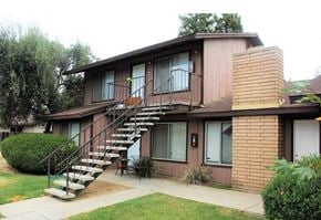 Merced house for rent - A house with a staircase leading to the second floor.