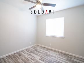 Merced house for rent - A room with a ceiling fan and a window is marked as sold.