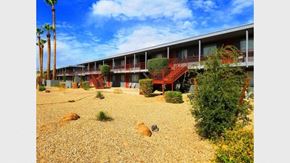 Phoenix apartment for rent - the courtyard of a motel with trees and plants