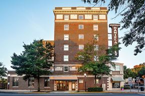 Valdosta apartment for rent - a large brick building with a sign on the side of it