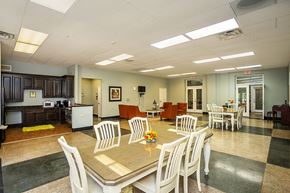 Valdosta apartment for rent - a conference room with a table and chairs