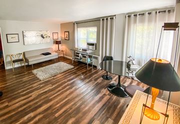 Omaha apartment for rent - a living room with a couch and a table