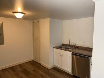 Richland apartment for rent - A small kitchen with a sink and a dishwasher.