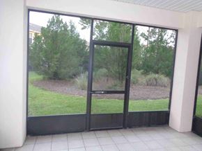 Orange Park house for rent - a view of the yard through a glass door