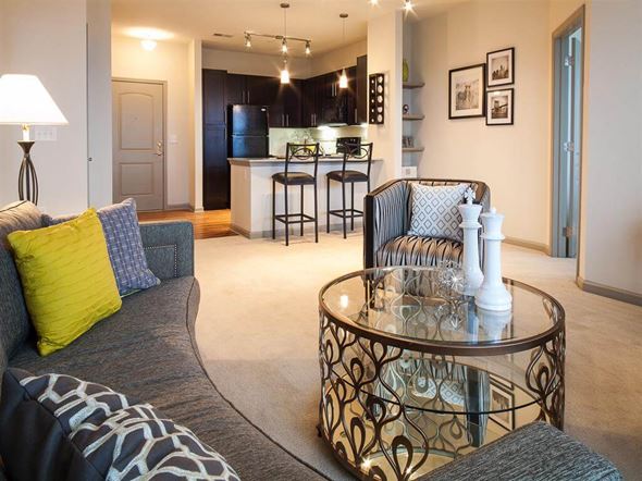 Sandy Springs apartment for rent - a living room and kitchen with a glass table
