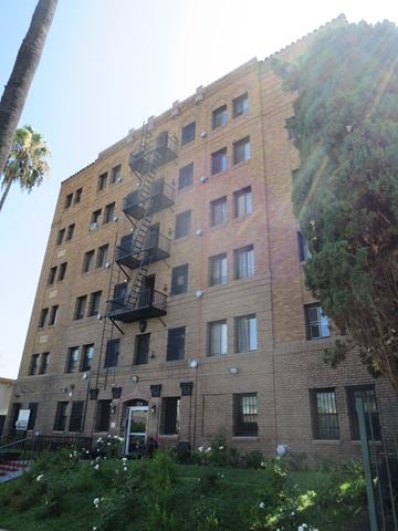 Los Angeles apartment for rent - a tall building with a fire escape on the side of it