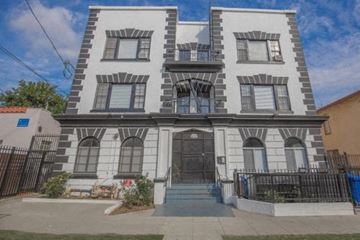 Los Angeles apartment for rent - the front of a white house with a black door