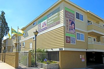 Chatsworth apartment for rent - Apartment building with a sign that says "Lantern Room Bed & Breakfast Apartments".