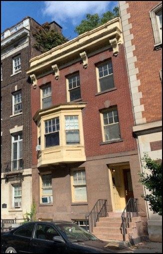 Albany apartment for rent - a brick building with a car parked in front of it