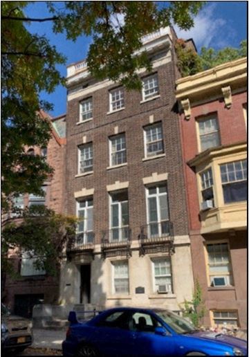 Albany apartment for rent - a blue car parked in front of a brick building