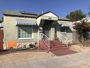 San Diego house for rent - an old house with stairs in front of it