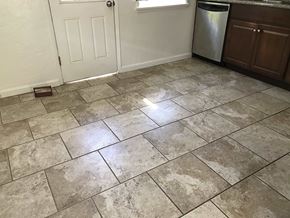 San Diego house for rent - a kitchen with a tiled floor and a refrigerator