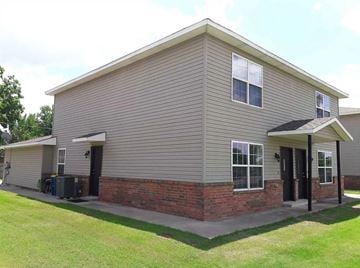 Stillwater house for rent - the outside of a house with a brick and siding