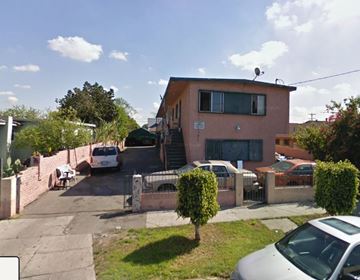 Los Angeles apartment for rent - A house with a white car parked in front.