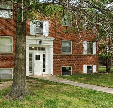 Cleveland Heights apartment for rent - a brick building with a tree in front of it