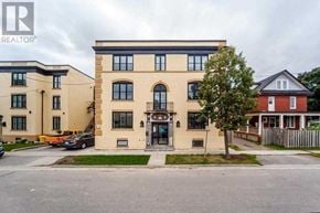 Oshawa apartment for rent - the front of a building with a street in front of it