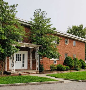 Cleveland Heights apartment for rent - the front of a brick building with a white door