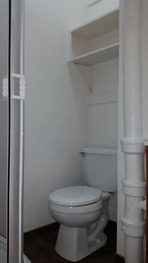 Phoenix apartment for rent - a small bathroom with a toilet and a shelf