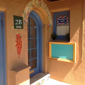 Phoenix apartment for rent - an arched window with a window seat and a pool