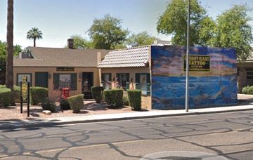Phoenix apartment for rent - a building with a mural on the side of a street