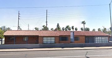 Phoenix apartment for rent - a red brick building on the side of a street