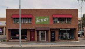Phoenix apartment for rent - the archery restaurant is on the corner of a city street