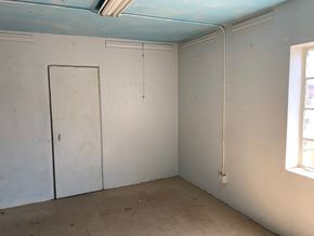 Phoenix apartment for rent - a room with white walls and a door