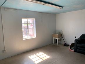 Phoenix apartment for rent - an empty room with a desk and a window