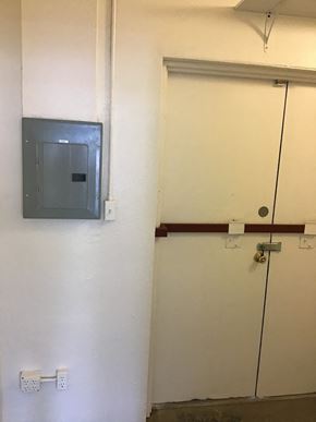 Phoenix apartment for rent - a door to a room with a sensor on the wall
