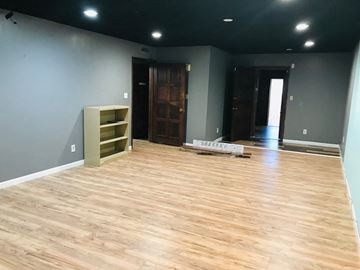 Phoenix apartment for rent - a living room with a hardwood floor and gray walls