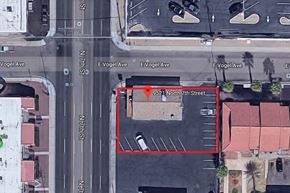 Phoenix apartment for rent - an aerial view of a parking lot with a car on the street