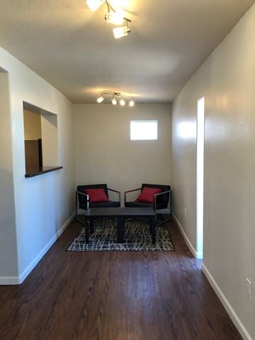 Phoenix apartment for rent - a living room with two chairs and a mirror