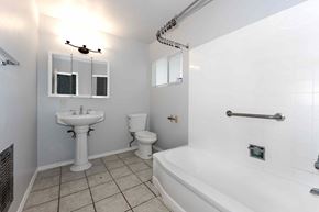 Los Angeles apartment for rent - A white sink and toilet in a small bathroom.